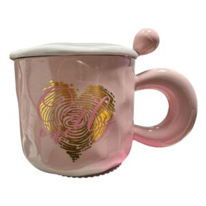 taza con tapa y cuchara