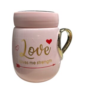 taza con tapa y asa dorada